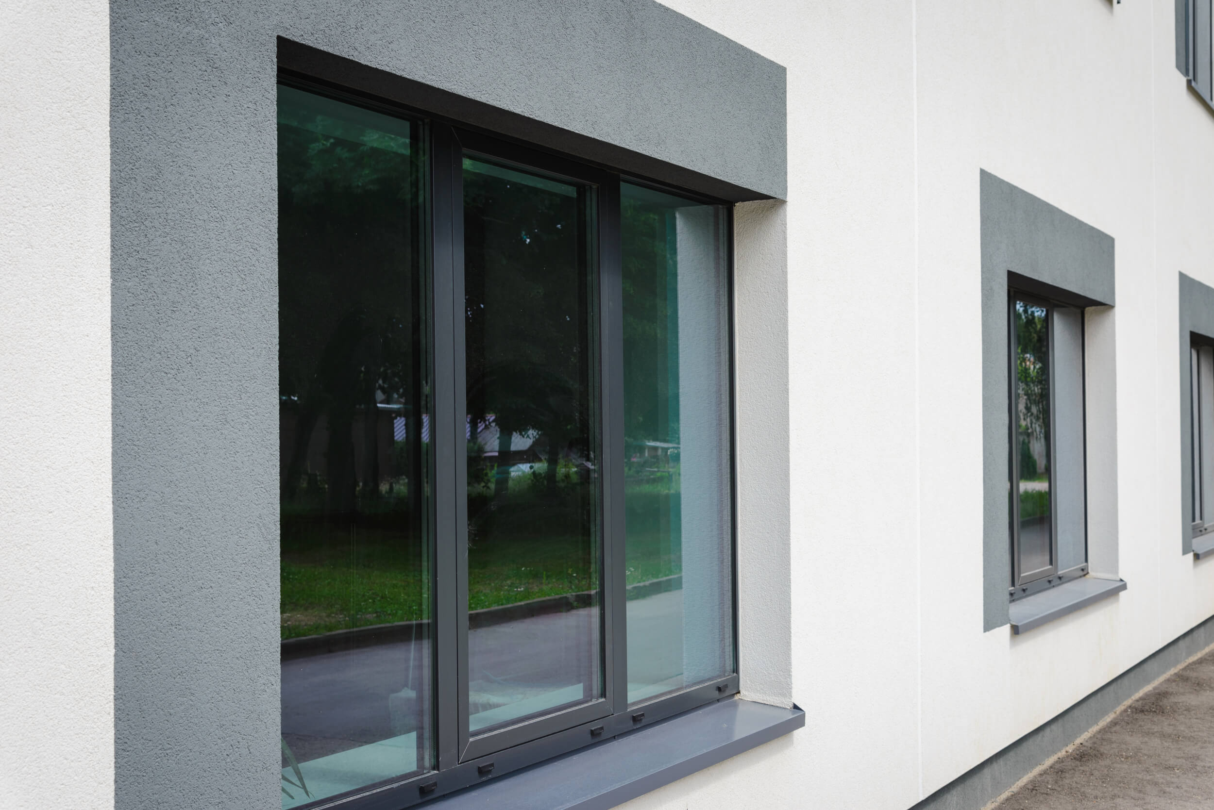 A Part Modern office building.Empty ground in front of modern wall facade building.